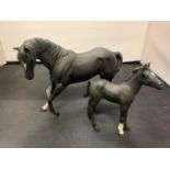 A BESWICK BLACK BEAUTY AND HER FOAL