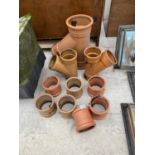AN ASSORTMENT OF DRAINAGE PIPE FITTINGS