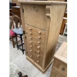 A VICTORIAN STYLE WELLINGTON TYPE CHEST OF SEVEN DRAWERS WITH DROP-DOWN TOP SECTION, 24" WIDE