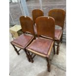 A SET OF FOUR OAK EARLY 20TH CENTURY DINING CHAIRS