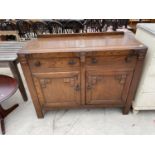 AN EARLY 20TH CENTURY OAK SIDEBOARD, 46" WIDE