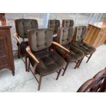 A SET OF SIX RETRO MCINTOSH TEAK FRAMED BUTTON BACK DINING CHAIRS (TWO CARVERS)