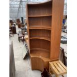 A RETRO TEAK G-PLAN CORNER UNIT ENCLOSING FOUR OPEN SHELVES AND CUPBOARD TO THE BASE, 43" WIDE