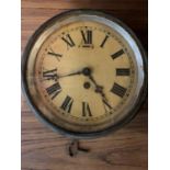 A VINTAGE BRASS SHIPS CLOCK WITH KEY MADE BY F W ELLIOTT LTD CROYDON 21B/829 ER 1952