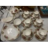 A ROYAL ALBERT 'OLD COUNTRY ROSES' TEA SET TO INCLUDE SIX TRIOS, TEAPOT AND SERVING BOWLS