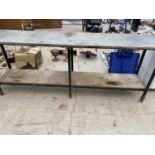 A LARGE METAL WORK BENCH WITH WOODEN SHELF UNDERNEATH
