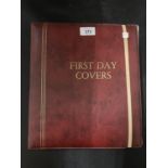 FIRST DAY COVER ALBUM CONTAINING A QUANTITY OF AUSTRALIAN COVERS + FIJI & AAT