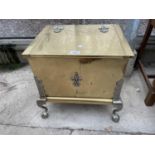 AN EARLY 20TH CENTURY BRASS COAL BOX WITH GALV LINER WITH METALWORK APPLIED DECORATION, ON BALL