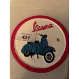 A CAST METAL ?VESPA SCOOTER? CIRCULAR SIGN