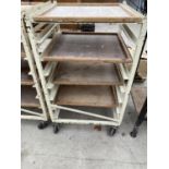 A FOUR SHELF METAL POTTERS TROLLEY