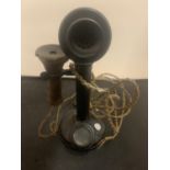 A VINTAGE CANDLESTICK TELEPHONE