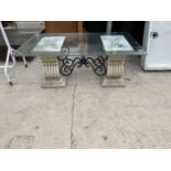 AN ORNATE VINTAGE PATIO COFFEE TABLE WITH STONE EFFECT LEGS AND GLASS TOP