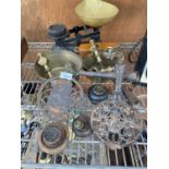 A LARGE COLLECTION OF BRASS WARE TO INCLUDE SCALES AND WEIGHTS, PANS AND TRIVET STAND ETC