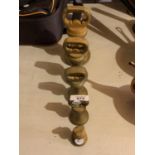 FIVE VARIOUS SIZED VINTAGE BRASS WEIGHTS