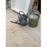 TWO VINTAGE METAL WATERING CANS