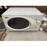 A WHITE DELONGHI MICROWAVE OVEN BELIEVED IN WORKING ORDER BUT NO WARRANTY