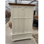 A MODERN WHITE PAINTED TWO DOOR WARDROBE WITH DRAWER TO THE BASE, 51" WIDE