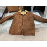 A BROWN SHEEP SKIN JACKET