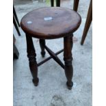 A VICTORIAN TURNED LEG STOOL