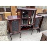 A VICTROIAN MAHOGANY TWO DOOR BOWFRONT DISPLAY CABINET FLANKED BY TWO CUPBOARD DOORS BEARING MUSICAL