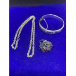 A SILVER BANGLE HALLMARKED BIRMINGHAM, A SILVER ROPE CHAIN MARKED 925 AND A SILVER RING TOTAL WEIGHT