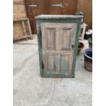 A LARGE VINTAGE WOODEN CUPBOARD WITH ONE INTERNAL SHELF