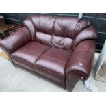 A MODERN BROWN LEATHER TWO SEATER SETTEE