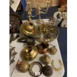 A LARGE QUANTITY OF SILVER PLATE AND BRASS TO INCLUDE TRAYS, CANDLEABRA, HORSESHOE, BELLS ETC