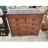 A VICTORIAN MAHOGANY CHEST OF TWO SHORT AND THREE LONG DRAWERS