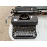 A VINTAGE REMINGTON TYPE WRITER