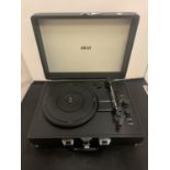 AN AKAI PORTABLE TURNTABLE