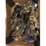 A BOX OF MIXED COSTUME JEWELLERY TO INCLUDE NECKLACES, BANGLES ETC