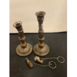 A PAIR OF VINTAGE SILVER PLATED ON COPPER CANDLESTICKS - HEIGHT 21CMS AND TWO WHITE METAL BOTTLE