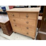 A VICTORIAN PINE CHEST OF TWO SHORT AND THREE LONG GRADUATED DRAWERS, 44" WIDE