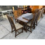 AN EXTENDING OAK DINING TABLE WITH FOUR DINING CHAIRS AND TWO CARVERS