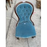 A VICTORIAN ROSEWOOD SPOON-BACK NURSING CHAIR