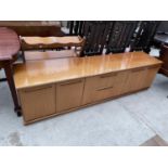 A RETRO TEAK MEREDEW LOW UNIT ENCLOSING TWO DRAWERS AND FOUR CUPBOARDS, 79" WIDE