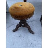 A SWIVEL STOOL ON MAHOGANY TRIPOD SUPPORT