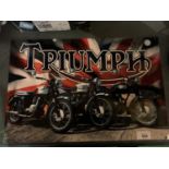 A TRIUMPH WITH THREE BIKES METAL SIGN