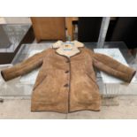 A BROWN SHEEP SKIN JACKET