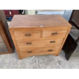 A SATINWOOD CHEST OF TWO SHORT AND TWO LONG DRAWERS