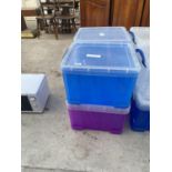 FOUR PLASTIC STACKABLE STORAGE BOXES WITH LIDS