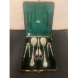 A VINTAGE BOXED SET OF SILVER PLATED FRUIT TOOLS TO INCLUDE A PAIR OF GRAPES SCISSORS AND A PAIR