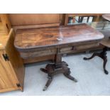 A REGENCY ROSEWOOD AND CROSSBANDED FOLD-OVER CARD TABLE ON QUATREFOIL BASE WITH BRASS CLAW FEET