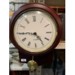 A QUARTZ WALL CLOCK IN WORKING ORDER