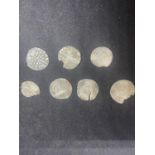 SEVEN HAMMERED COINS