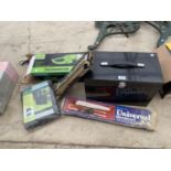 A COLLECTION OF ITEMS TO INCLUDE A METAL TIN, A THREE PIECE BBQ SET, A BBQ COVER ETC