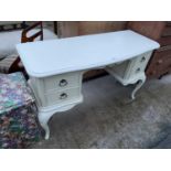 A WHITE WILLIS & GAMBIER DRESSING TABLE, ON CABRIOLE LEGS, 50" WIDE