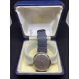 A BULOVA LONGCHAMP 9 CARAT GOLD WRISTWATCH ENGRAVED IN WORKING ORDER WITH PRESENTATION BOX