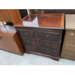 A MODERN MAHOGANY AND CROSSBANDED TV CABINET IN THE FORM OF A SIX DRAWER CHEST, 30" WIDE